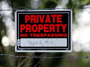 A sign outside the property where, according to British news reports, Prince Harry and Meghan, Duchess of Sussex, spent the holidays at the end of 2019, in North Saanich, B.C.