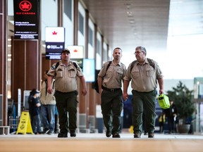 Terry White, Kirk Webster & Paul Schnurr of the Nova Scotia Department of Lands and Forestry depart for Australia From Halifax Stanfield Airport in Halifax, Nova Scotia on Wednesday, Jan. 15, 2020.