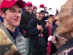 Nick Sandmann smiles at Native American elder Nathan Phillips in a screengrab from a video of an incident took place at the Lincoln Memorial in Washington, D.C., on Jan. 18, 2019.
