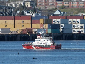 A coast guard ship patrols the Saint John River at Saint John, New Brunswick.