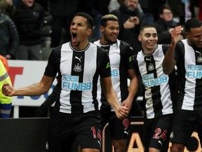 Newcastle United's Isaac Hayden celebrates scoring their first goal with teammates  Jan. 18, 2020.