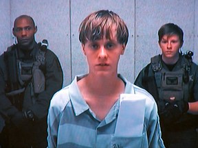 Dylann Storm Roof appears by closed-circuit television at his bond hearing in Charleston, South Carolina, U.S. June 19, 2015 in a still image from video.