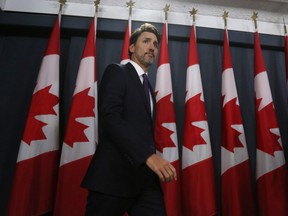 Canadian Prime Minister Justin Trudeau arrives for a news conference on January 9, 2020 in Ottawa, Canada. - Prime Minister Justin Trudeau said Thursday that Canada had intelligence from multiple sources indicating that a Ukrainian airliner which crashed outside Tehran was mistakenly shot down by Iran.