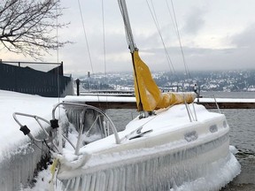 A sailboat encased in ice is shown in an RCMP handout photo. Mounties in West Kelowna, B.C., have released the photo of a sail boat covered in icicles in the hope that its owner might recognize the frozen vessel. THE CANADIAN PRESS/HO-RCMP MANDATORY CREDIT