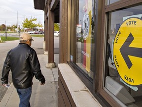 A man heads to a polling station in Brantford, Ont., for the Oct. 21, 2019, federal election.