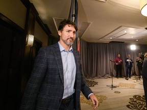 Prime Minister Justin Trudeau arrives to speak to media during the Liberal cabinet retreat in Winnipeg, Sunday, Jan. 19, 2020.