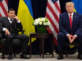 U.S. President Donald Trump and Ukrainian President Volodymyr Zelensky looks on during a meeting in New York on September 25, 2019, on the sidelines of the United Nations General Assembly.