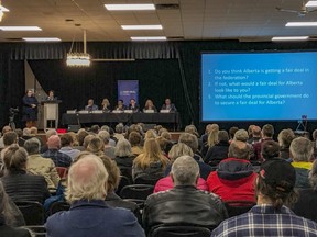 A Fair Deal Panel is held in Airdrie, Alta.,  on Jan. 27.