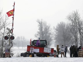 First Nations members of the Tyendinaga Mohawk Territory block train tracks servicing Via Rail, as part of a protest against British Columbia's Coastal GasLink pipeline, in Tyendinaga, Ontario, Canada February 13, 2020.