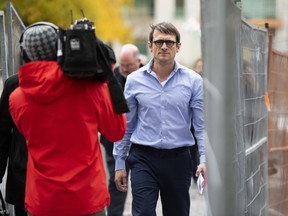 As a senior RCMP intelligence official faces charges of revealing secret information, new figures reveal thousands of incidents last year in which federal agencies, including the national police force, mishandled sensitive documents. Cameron Ortis, a senior intelligence official at the RCMP, walks with his lawyer Ian Carter, obscured at left, after leaving the courthouse in Ottawa after being granted bail, Tuesday, Oct. 22, 2019. THE CANADIAN PRESS/Justin Tang