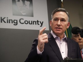 King County Executive Dow Constantine addresses a news conference at Public Health Seattle & King County Saturday, Feb. 29, 2020, in Seattle. A man in his 50s with underlying health conditions became the first coronavirus death on U.S. soil. The man had underlying health conditions and no history of travel or contact with a known COVID-19 case, health officials in Washington state said.