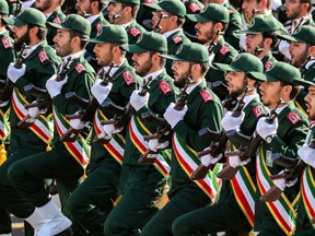 Members of the Islamic Revolutionary Guard Corps march during a military parade in Tehran in 2018.