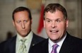 Current Conservative leadership candidates John Baird, right, and Peter MacKay speak to reporters in the foyer of the House of Commons in Ottawa on June 22, 2011, when Baird was foreign affairs minister and MacKay was defence minister.