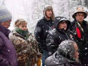 Unist'ot'en Chief Doris Rosso speaks to supporters of the Unist'ot'en camp and Wet'suwet'en people as they gather around a camp fire off a logging road near Houston, B.C., in 2019.