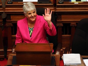 Minister of Finance Carole James waves to people in the sitting area before she delivers her budget speech from the legislative assembly at B.C. Legislature in Victoria, B.C., on Tuesday, February 18, 2020.