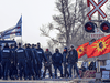 Ontario Provincial Police officers at a rail blockade in Tyendinaga Mohawk Territory, near Belleville, Ont., on Feb. 24, 2020.