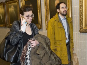 Clara Wasserstein, left, and Yochonon Lowen arrive at courthouse in Montreal on February 10, 2020. The lawyer for a couple who left their ultra-Orthodox Hasidic community is telling a courtroom that the Jewish schools operating north of Montreal are illegal and leave no time for secular education. In his closing arguments today, Bruce Johnston told Superior Court Justice Martin Castonguay that the judge can push the Quebec government to do something to fix that situation. Johnston is representing Yochonon Lowen and his wife Clara Wasserstein, who have filed legal action against the Quebec government and ultra-Orthodox Hasidic schools in Boisbriand, Que.