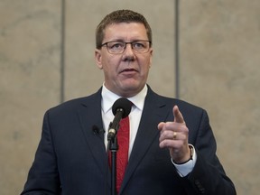 Saskatchewan Premier Scott Moe speaks with the media following a meeting with Prime Minister Justin Trudeau on Parliament Hill in Ottawa, Tuesday November 12, 2019. Saskatchewan Premier Scott Moe says he will appoint a special mediator to an intensifying labour dispute at the Co-op Refinery Complex, but only if the union removes its blockades.
