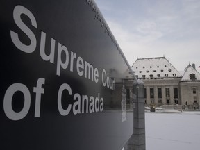 The Supreme Court of Canada is seen, Thursday January 16, 2020 in Ottawa. A Supreme Court of Canada decision could affect whether government lawyers can use confidential documents to defend their reputations if political bosses "throw them under the bus," a law professor says. The top court is to rule Thursday on whether it will hear an appeal of a case involving Alex Cameron, a former lawyer with the Nova Scotia Department of Justice seeking to sue Premier Stephen McNeil and the former justice minister for defamation.