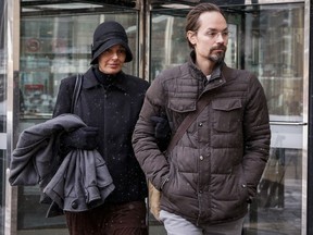 Jennifer and Jeromie Clark, leave a sentencing hearing after to couple were found guilty of criminal negligence causing the death of their 14-month-old son in 2013, outside the courts centre in Calgary, Friday, Feb. 8, 2019. A Calgary father convicted of criminal negligence in his 14-month-old son's death has been granted day parole eight months into his 32-month sentence.