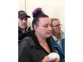 Francis Boyer, left, and Caroline Sarrasin, centre, parents of thirteen-year-old Oceane Boyer whose body was found by police on a public road arrive at the Saint-Jerome, Que. courthouse on Friday, February 28, 2020.