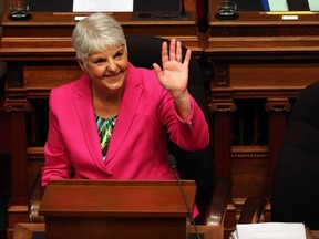 Minister of Finance Carole James waves to people in the sitting area before she delivers her budget speech from the legislative assembly at B.C. Legislature in Victoria, B.C., on Tuesday, February 18, 2020. The chairman of the Childhood Obesity Foundation says a new tax on sugary soda will improve the health of British Columbia's children.