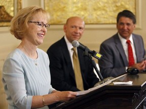 Dr. Aldona Wos, North Carolina's health and human services secretary, thanks her DHHS staffers in the audience for their hard work as Rick Brajer and Gov. Pat McCrory listen during a press conference on Wednesday, Aug. 5, 2015, at the Governor's Mansion in Raleigh, NC. President Donald Trump has nominated a North Carolina Republican, physician and former diplomat as the next U.S. ambassador to Canada. The White House says Dr. Aldona Z. Wos who is currently serving as the vice-chair of the Presidents Commission on White House Fellowships has been named to the post, which has been vacant since August