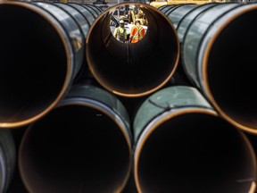 Pipe for the Trans Mountain pipeline is unloaded in Edson, Alta. on Tuesday June 18, 2019. The Federal Court of Appeal is set to release its decision on the latest challenge of the Trans Mountain pipeline expansion today.