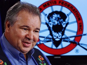 David Chartrand of the Manitoba Metis Federation takes part in a press conference on Parliament Hill in Ottawa on Friday March 8, 2013. A group of Metis citizens from Western Canada was left waiting in the cold as they sought approval from federal bureaucrats to enter an Ottawa building meant to be a space for Indigenous Peoples.