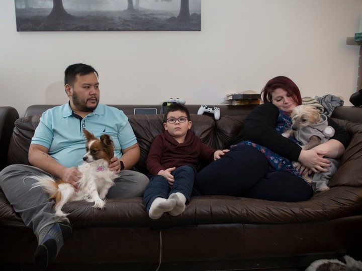  Left to right; Alexsius Chen, five-year-old son Anais Chen, and his wife Kristin Chen at home. The Chens lost their daughter Ailah to sudden infant death syndrome in June 2018. Mississauga, Ont., February 12, 2020. Nick Kozak / Postmedia