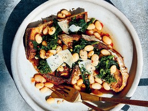 Garlicky Great Northern beans and broccoli rabe over toast