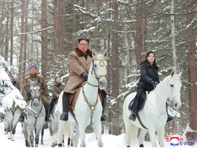 North Korean leader Kim Jong Un rides a horse as he visits battle sites in areas of Mt Paektu, Ryanggang, North Korea, in this undated picture released by North Korea's Central News Agency (KCNA) on December 4, 2019.
