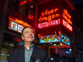 Alberta Premier Jason Kenney stops to talk with media before having dinner in the Silver Dragon restaurant in CalgaryÕs Chinatown on Saturday, February 1, 2020.