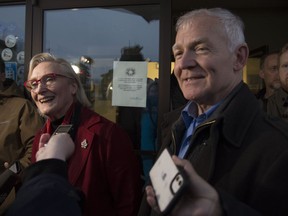Minister of Crown-Indigenous Relation, Carolyn Bennett and B.C. Indigenous Relations Minister Scott Fraser smile as they leave talks at the Wet'suwet'en offices in Smithers, B.C., Thursday, February 27, 2020. The Ministers along with Wet'suwet'en hereditary chiefs to discussed the ending blockades happening across the country. The blockades are set up by those opposed to the LNG pipeline in northern British Columbia.