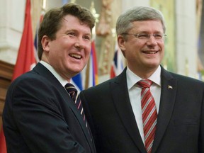 Prime Minister Stephen Harper welcomes new MP John Williamson at the start of caucus meetings in Ottawa, Wednesday June 1, 2011. Another Conservative MP is testing the waters for a leadership bid. New Brunswick’s John Williamson is considering entering the race.