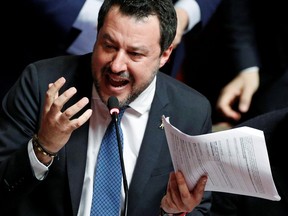Leader of Italy's far-right party Matteo Salvini gestures at the Senate ahead of a vote on whether to pursue an investigation against him that could give rise to a trial for alleged kidnapping of migrants, in Rome, Italy February 12, 2020.