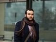 Omar Khadr leaves Court of Queen's Bench in Edmonton, on March 25, 2019, after a judge declared his sentence expired.