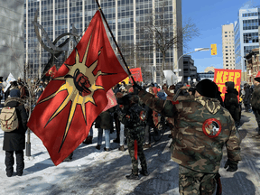 Marchers hold demonstration at the Manitoba Law Courts during a march in solidarity with the Wet’suwet’en Hereditary Chiefs in Winnipeg on Feb. 18, 2020.