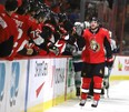 Senators’ Bobby Ryan celebrates the first of his three goals against the Canucks on Thursday night in Ottawa. (THE CANADIAN PRESS)