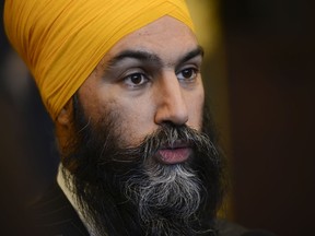 NDP Leader Jagmeet Singh talks to reports on Parliament Hill following a caucus meeting in Ottawa on Wednesday, Feb. 19, 2020.