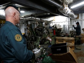 Spanish civil guards stand in an illegal underground tobacco factory during a police raid in Monda, near Malaga, in southern Spain, February 20, 2020.