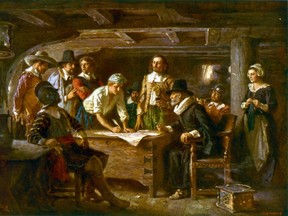 An artist's depiction of the signing of the Mayflower Compact.