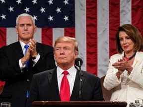 U.S. President Donald Trump delivers the State of the Union address, alongside Vice President Mike Pence and Speaker of the House Nancy Pelosi, at the US Capitol in Washington, DC, on February 5, 2019.