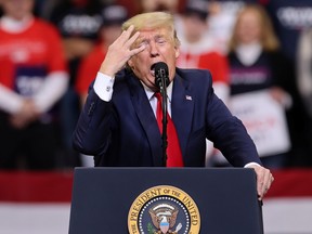 U.S. President Donald Trump mocks House Intelligence Committee Chairman Adam Schiff (D-CA) as he rallies with supporters in Des Moines, Iowa, U.S. January 30, 2020.