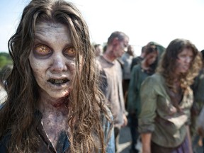 Zombies appear in a scene from the second season of the AMC original series, "The Walking Dead,"