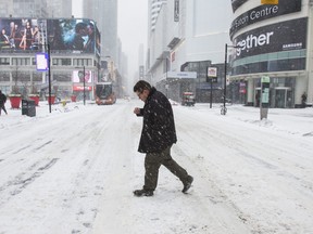 Early stages of the winter storm along Yonge and Dundas Streets in Toronto, Ont. on Tuesday February 12, 2019.