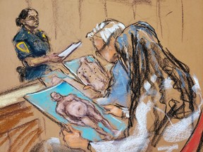 Photos are passed around to the jury during film producer Harvey Weinstein's sexual assault trial at New York Criminal Court in the Manhattan borough of New York City, New York, U.S. February 4, 2020 in this courtroom sketch.