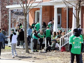 Queen's University students gather to celebrate St. Patrick's Day in Kingston, Ont., on March 14, despite public health officials telling Canadians to stay home and avoid large gatherings.