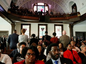 Attendees stand and turn their backs on Democratic U.S. presidential candidate Michael Bloomberg as he talks about his plans to help the U.S. black community during a commemoration ceremony for the 55th anniversary of the "Bloody Sunday" march in the Brown Chapel AME Church in Selma, Alabama, U.S., March 1, 2020.