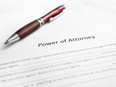 Power of Attorney legal document with pen